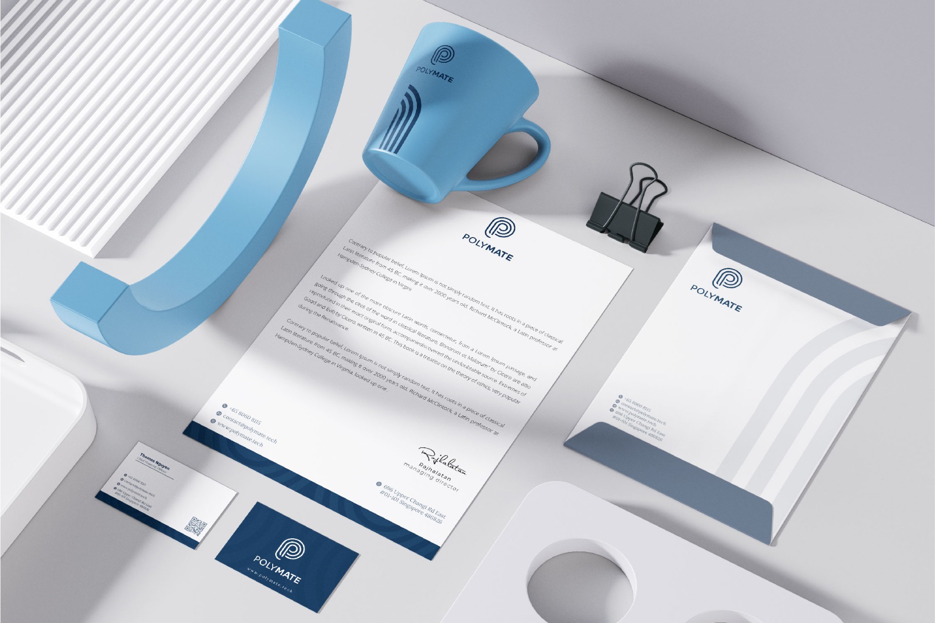 Stationery suite. Letterhead, envelope and business cards.