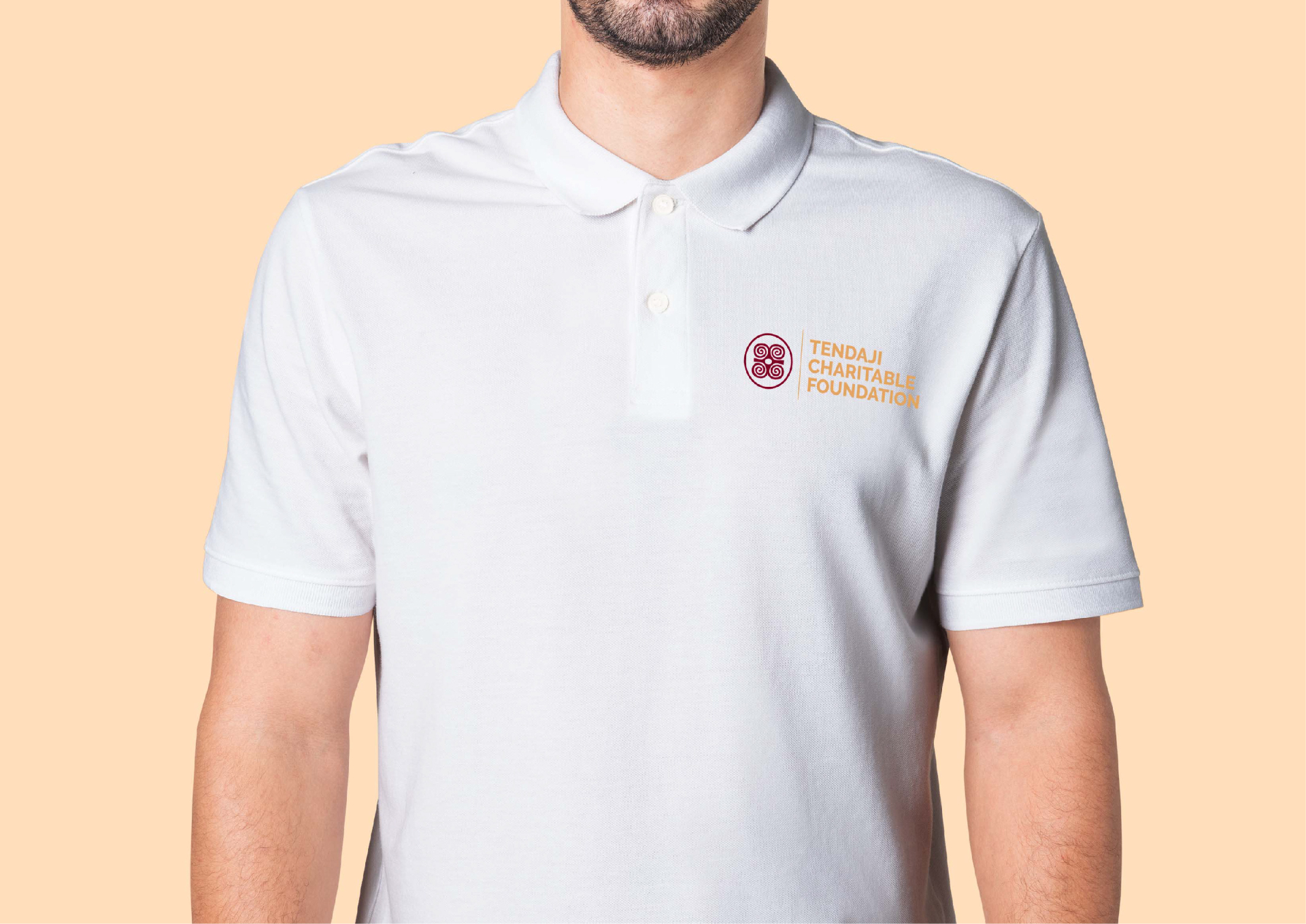 Polo shirt in the sand and burgundy secondary lockup.